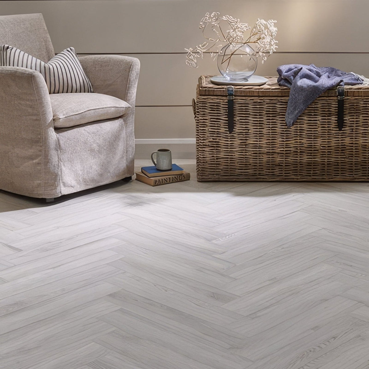 Light gray herringbone patterned wood flooring made from seamist oak in the weymouth collection