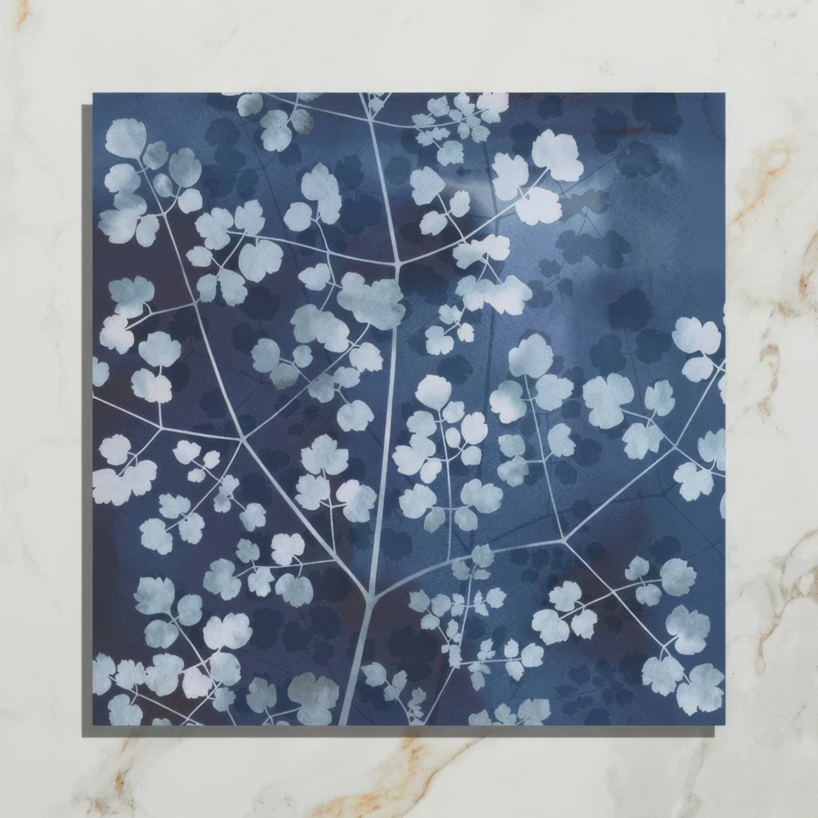 Wild Botanicals Porcelain Blue By Clarissa Hulse dark blue porcelain tile with white leaf patterns