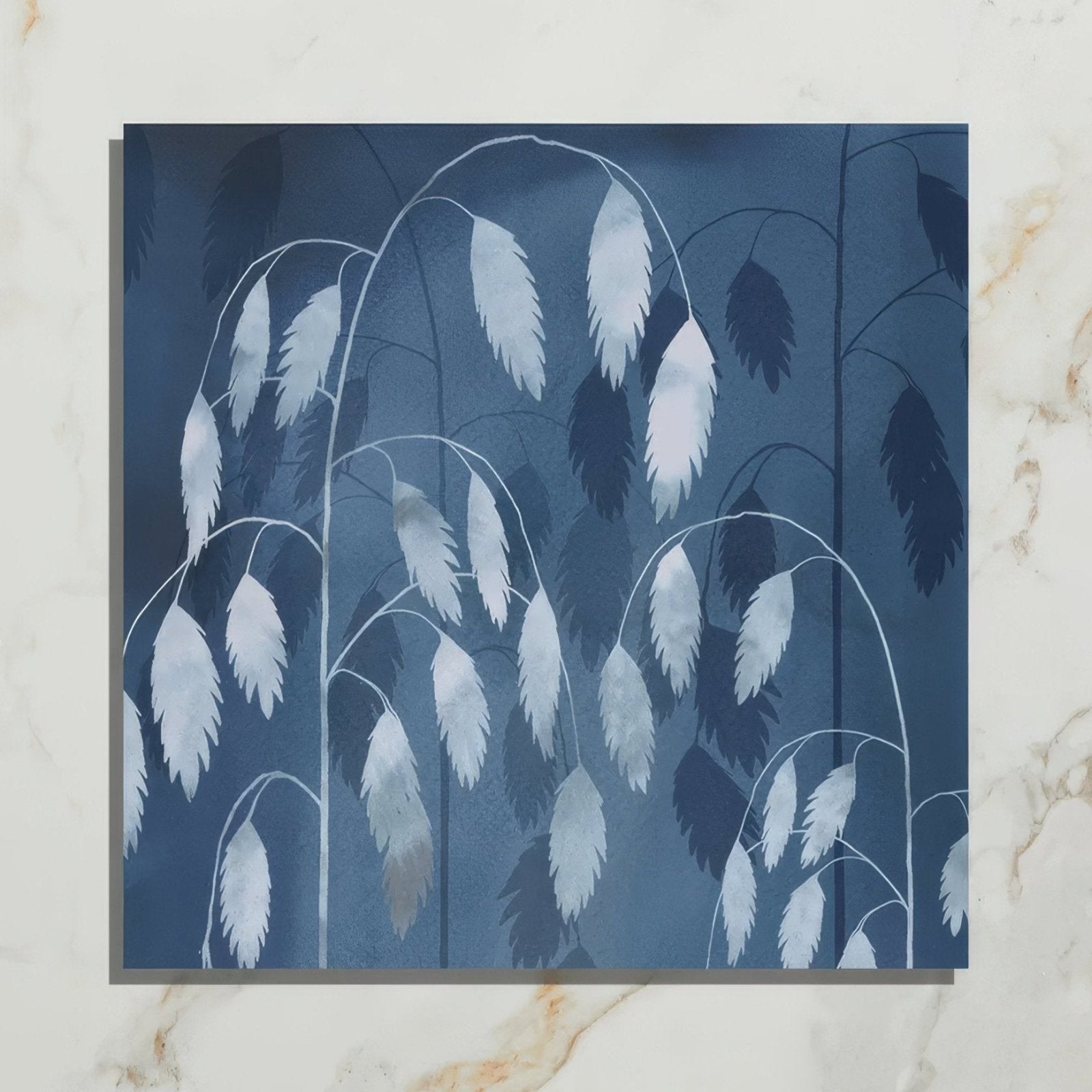 Blue-toned porcelain artwork featuring delicate white oat stalk silhouettes on a deep indigo background by clarissa hulse