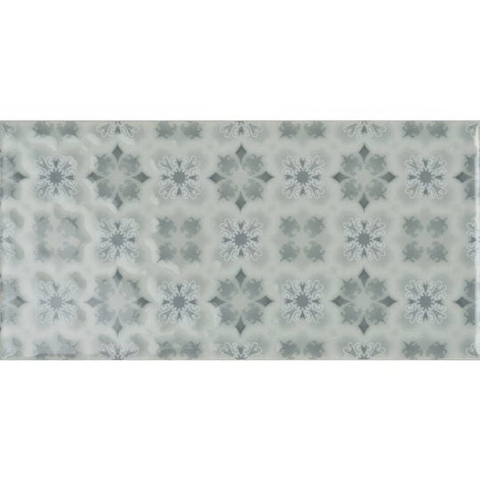 A rectangular ceramic tile wisley on sudbury with a subtle gray and white ornamental pattern on a light background