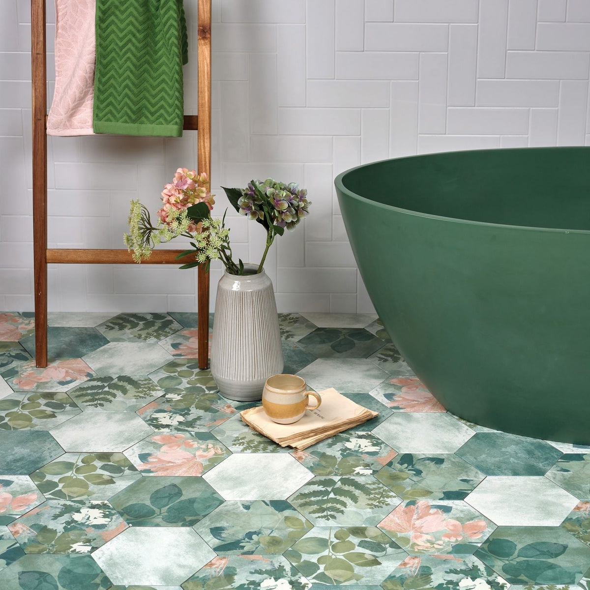 Emerald green freestanding porcelain bathtub with smooth rounded edges and modern minimalist design woodland glade porcelain
