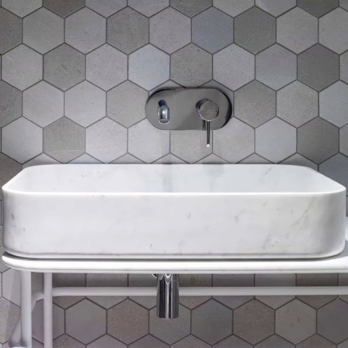World Hexagon Texture Grey Mosaic grey hexagonal textured mosaic with a white marble sink and chrome tap