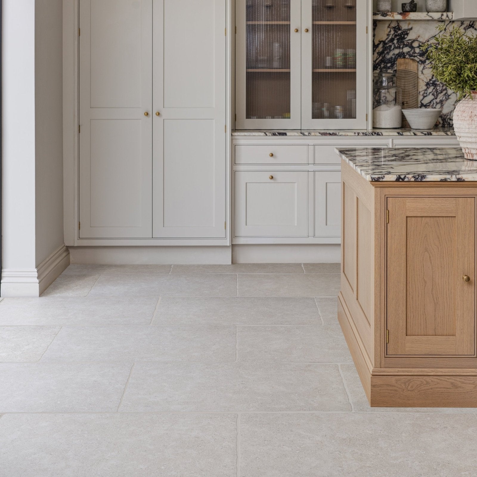 Wychwood Claire porcelain matt floor tiles in light gray with a subtle matte finish measuring 60 by 90 centimeters