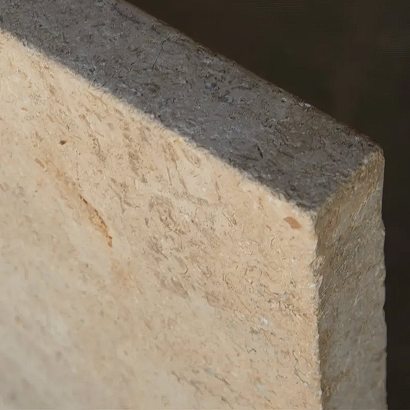 Wychwood limestone tumbled and etched double pencil coping beige stone slab with rough texture and dark gray concrete edge