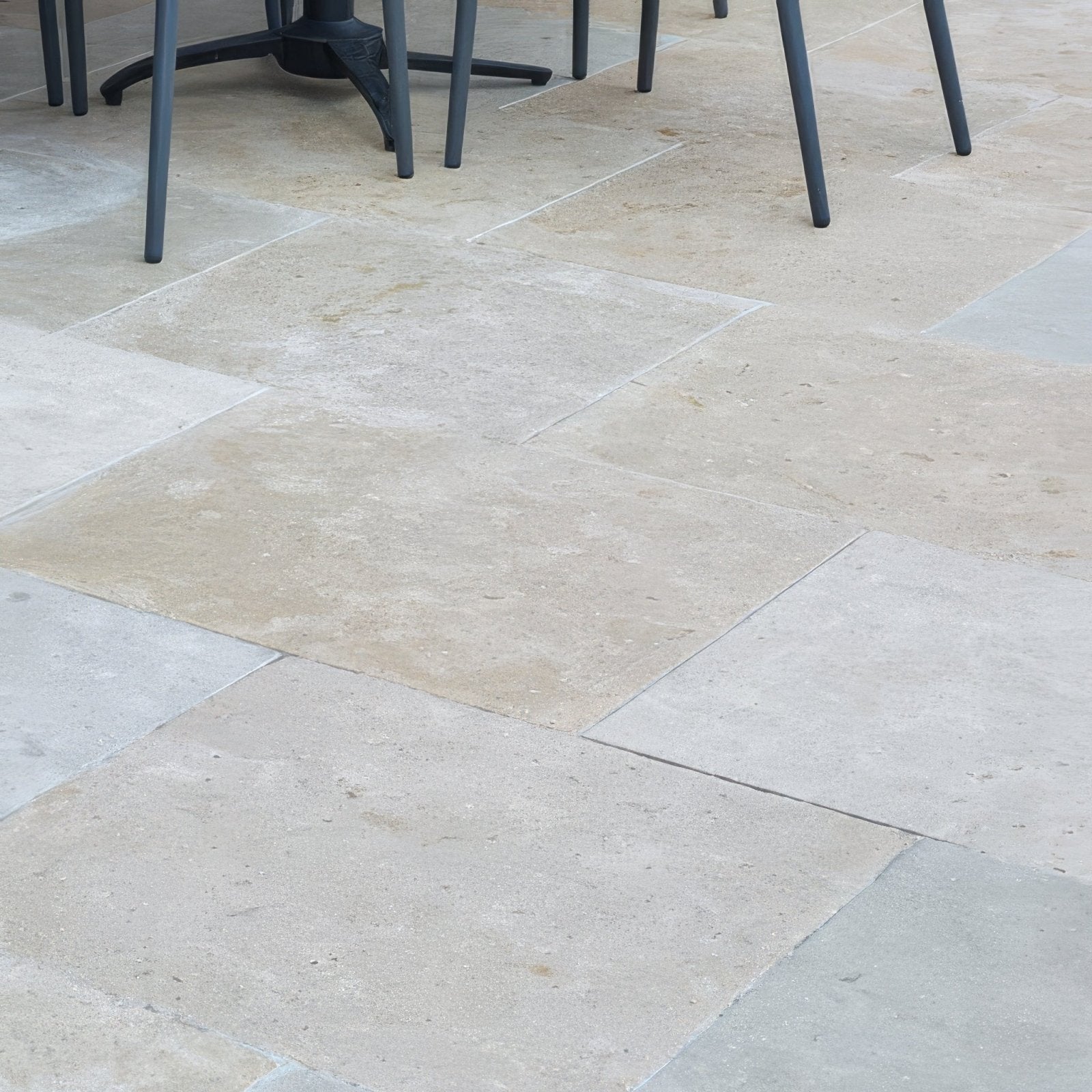 Beige wychwood limestone patio tiles with tumbled and etched finish and natural slightly textured surface