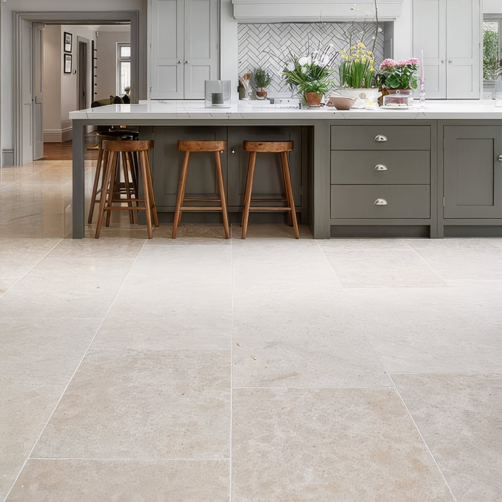 Beige wychwood limestone tumbled finish floor tiles with subtle natural veining in 60 x random sizes