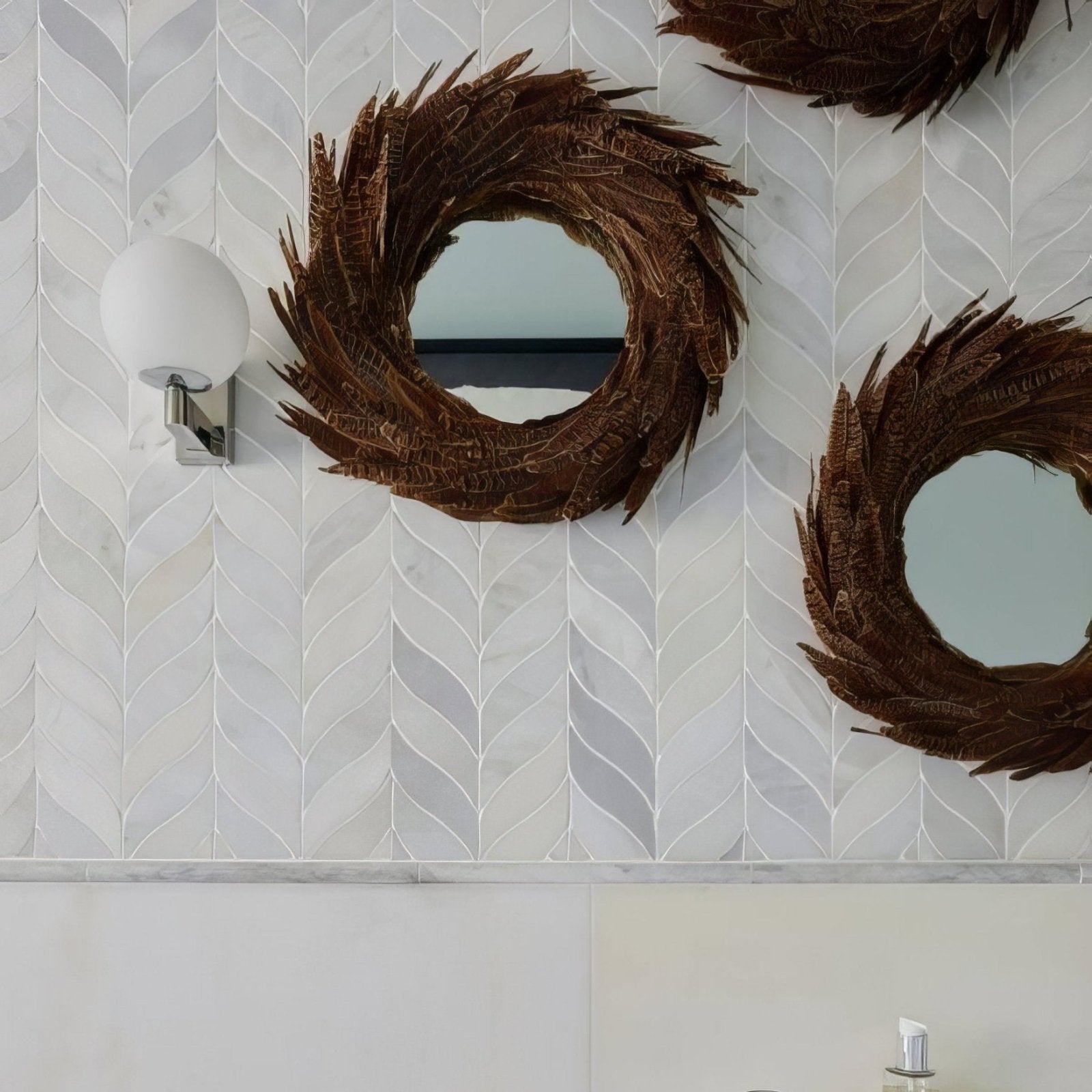Zen Marble Leaf Mosaic white marble leaf mosaic with a brown feathered circular mirror