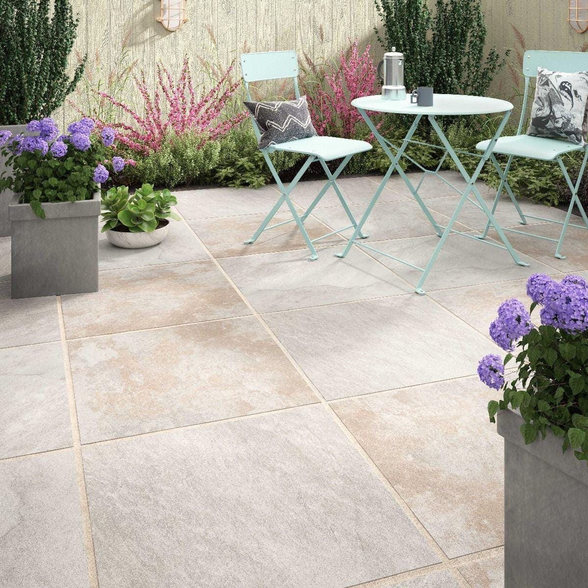 Light gray stone-effect Adlington White 20mm patio tiles with subtle natural veining for outdoor flooring