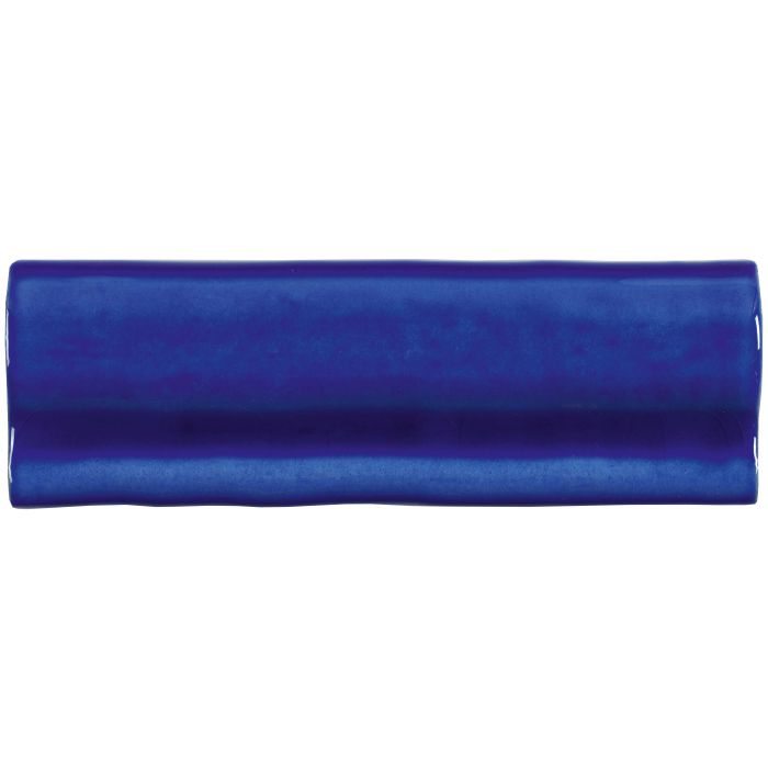 A glossy royal blue rectangular ceramic tile with rounded edges and smooth finish from Amun Torus Moulding