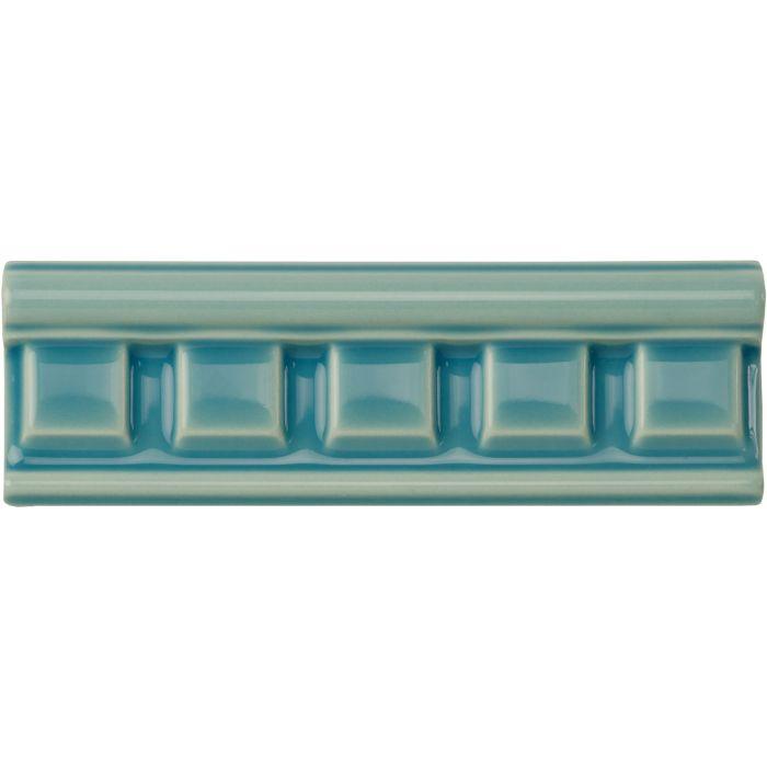 Aqua source dentil moulding rectangular ceramic tile with glossy teal glaze and raised square decorative elements
