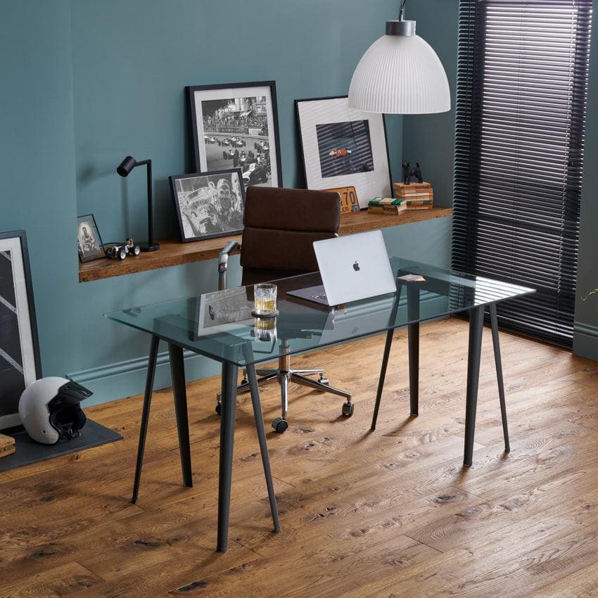Modern glass desk with sleek black metal legs and minimalist design from berkeley cathedral oak collection