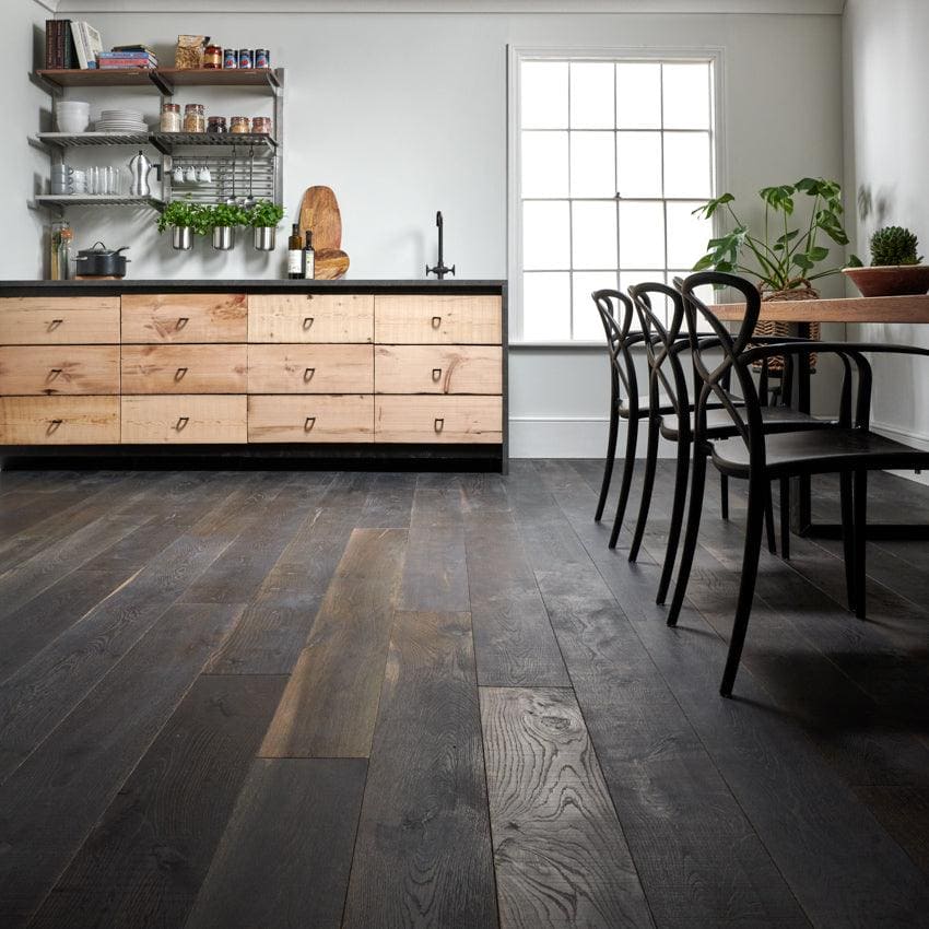 Dark gray berkeley cellar oak wood plank flooring with a rustic natural grain pattern in oak material