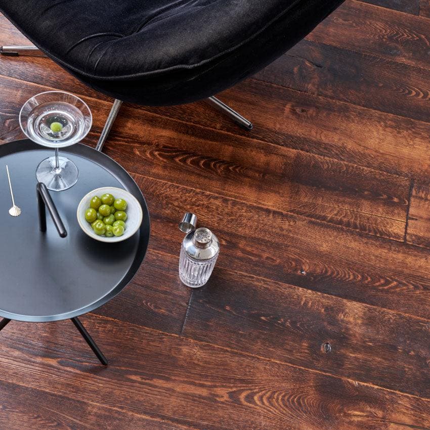 Black round side table with slender metal legs and matte finish from the Berkeley Priory Oak collection