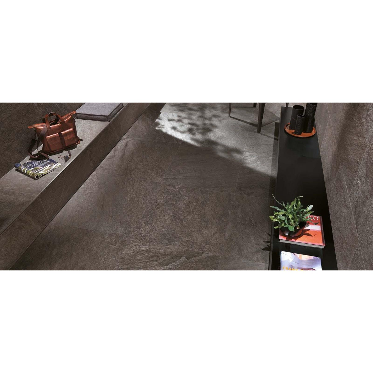 Dark gray stone-look bravestone outdoor earth 20mm floor tiles with subtle natural veining pattern