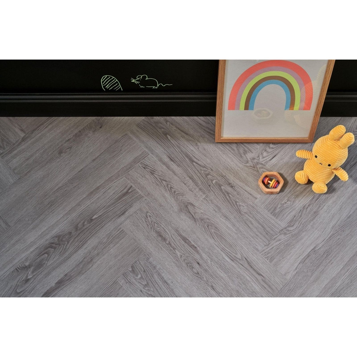 Brecon whisper oak herringbone gray vinyl flooring with realistic wood grain texture and herringbone pattern