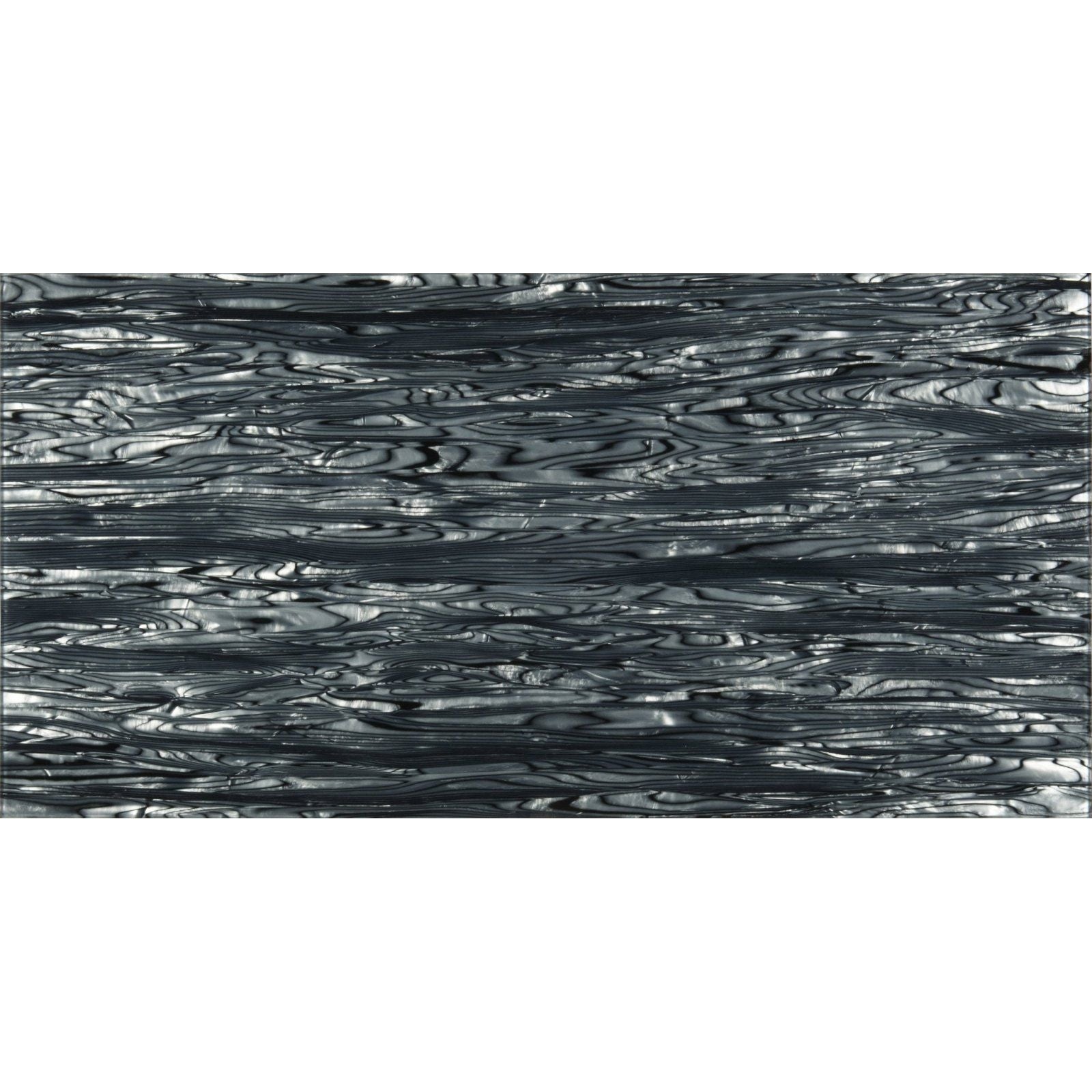 Caeli decorative glass panel with black and silver marbled glossy wavy texture for interior design
