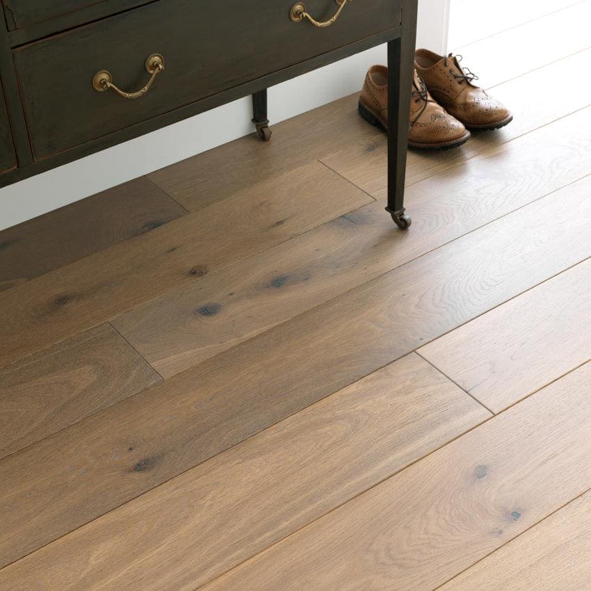 Warm-toned chepstow washed oak hardwood floor planks with natural wood grain finish