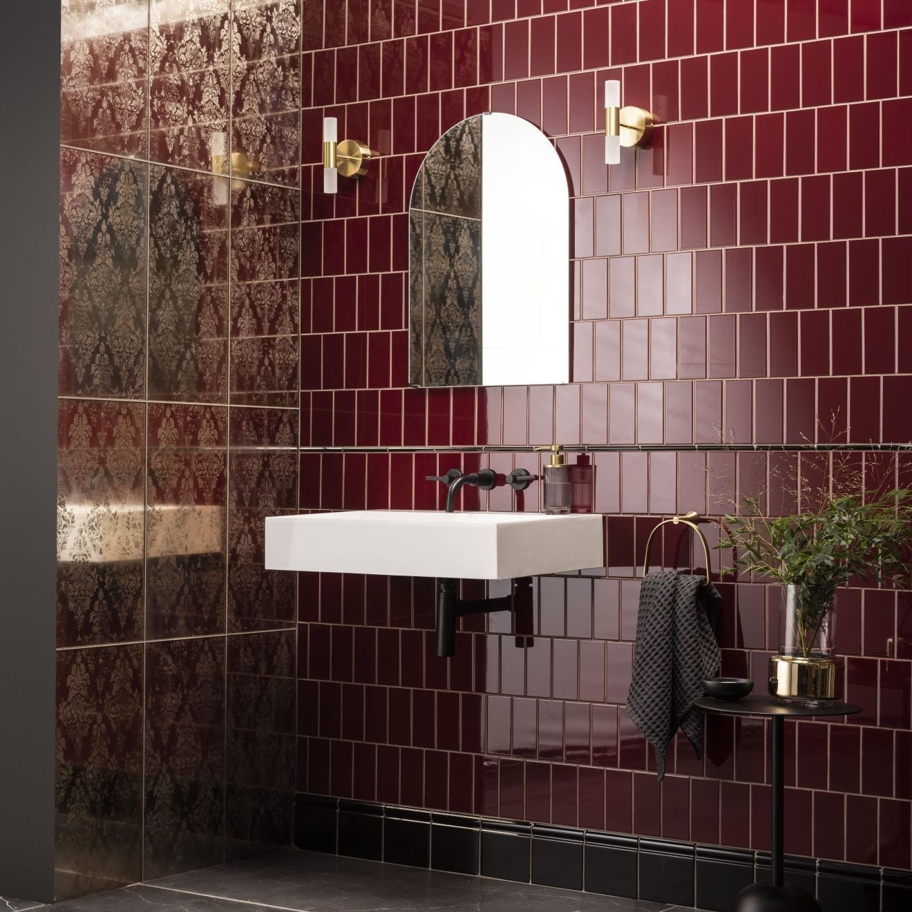 White rectangular wall-mounted sink with black faucet and chrome fixtures in damask distressed rose gold style