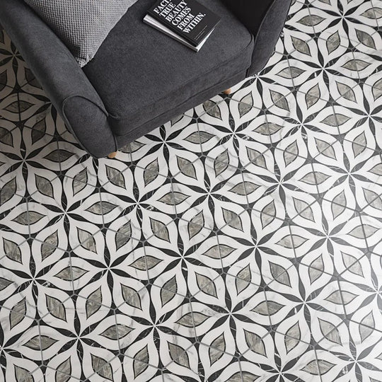 Black and white marble patterned elazig hexagon floor tiles with repeating geometric leaf design