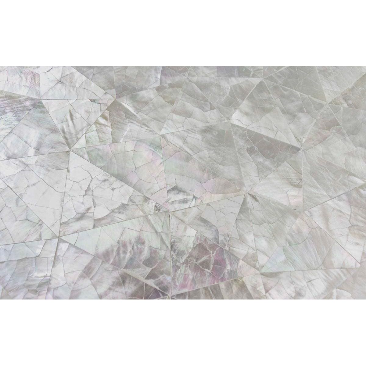 Feature panel crackle with geometrically patterned iridescent triangular pieces resembling mother of pearl surface