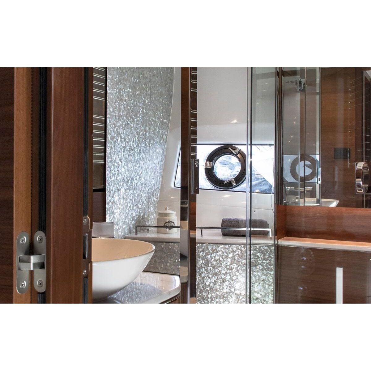 Feature Panel Crackle crackle-glass mosaic panel with a white ceramic bowl sink