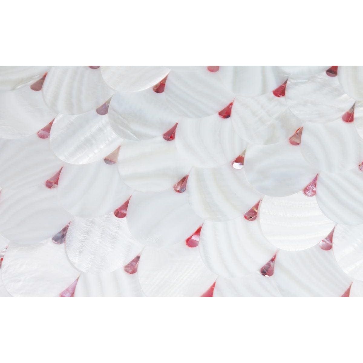 Feature panel pearl drop showing white translucent shell-like scales with subtle pink triangular accents