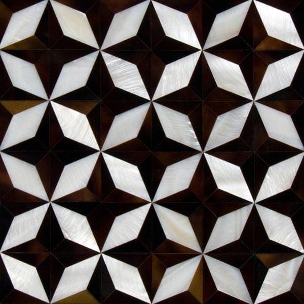 Black and white mother-of-pearl inlay tiles forming a geometric star pattern in the feature panel starlink design