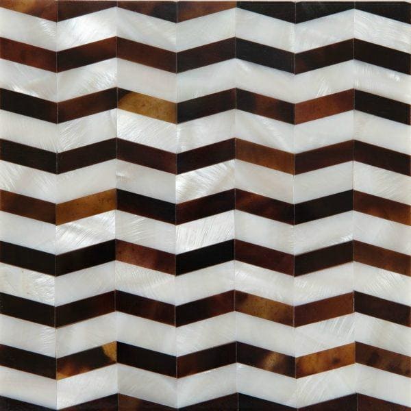 A feature panel wave mosaic tile with chevron pattern in white mother-of-pearl and dark brown tortoiseshell