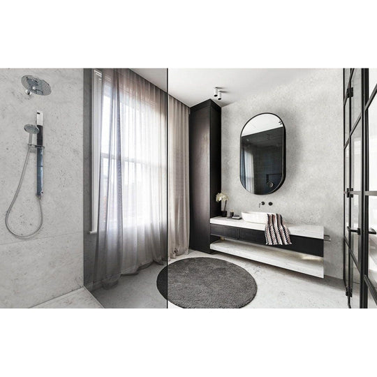 Feature Panel Whisper mother-of-pearl mosaic panel beside a black oval mirror above a vanity