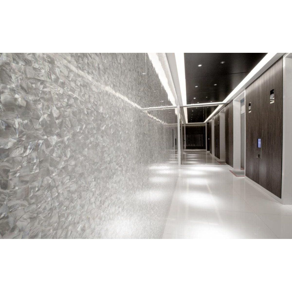 Textured white feature panel whisper with crystalline faceted surface for decorative wall applications