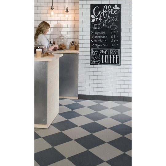 Flat Steel Grey Tiles steel-grey floor tiles in a chequerboard pattern