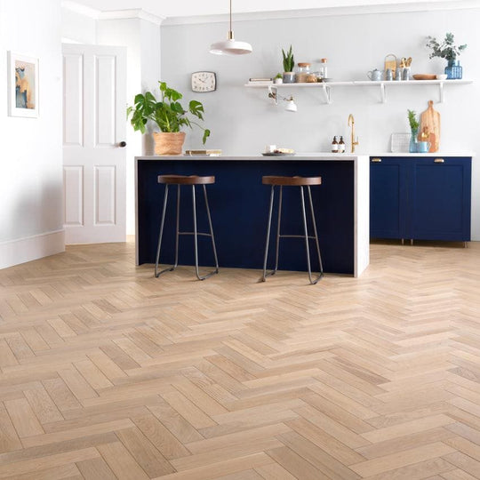 Goodrich ecru oak light oak herringbone hardwood floor showcasing natural wood grain and smooth finish