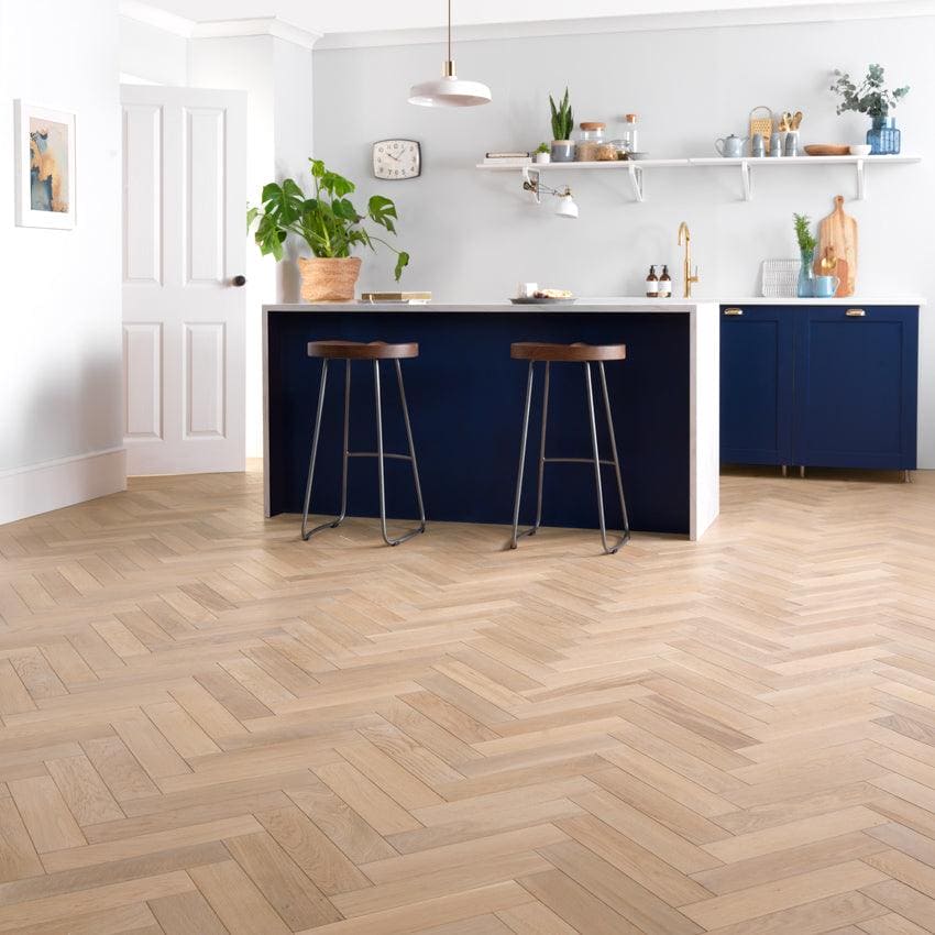 Goodrich ecru oak light oak herringbone hardwood floor showcasing natural wood grain and smooth finish