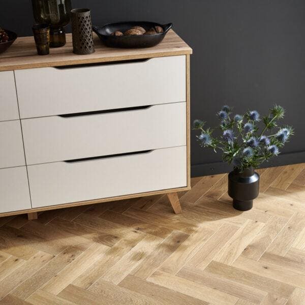 Modern white dresser with light smoked oak wood frame and tapered legs in Goodrich style