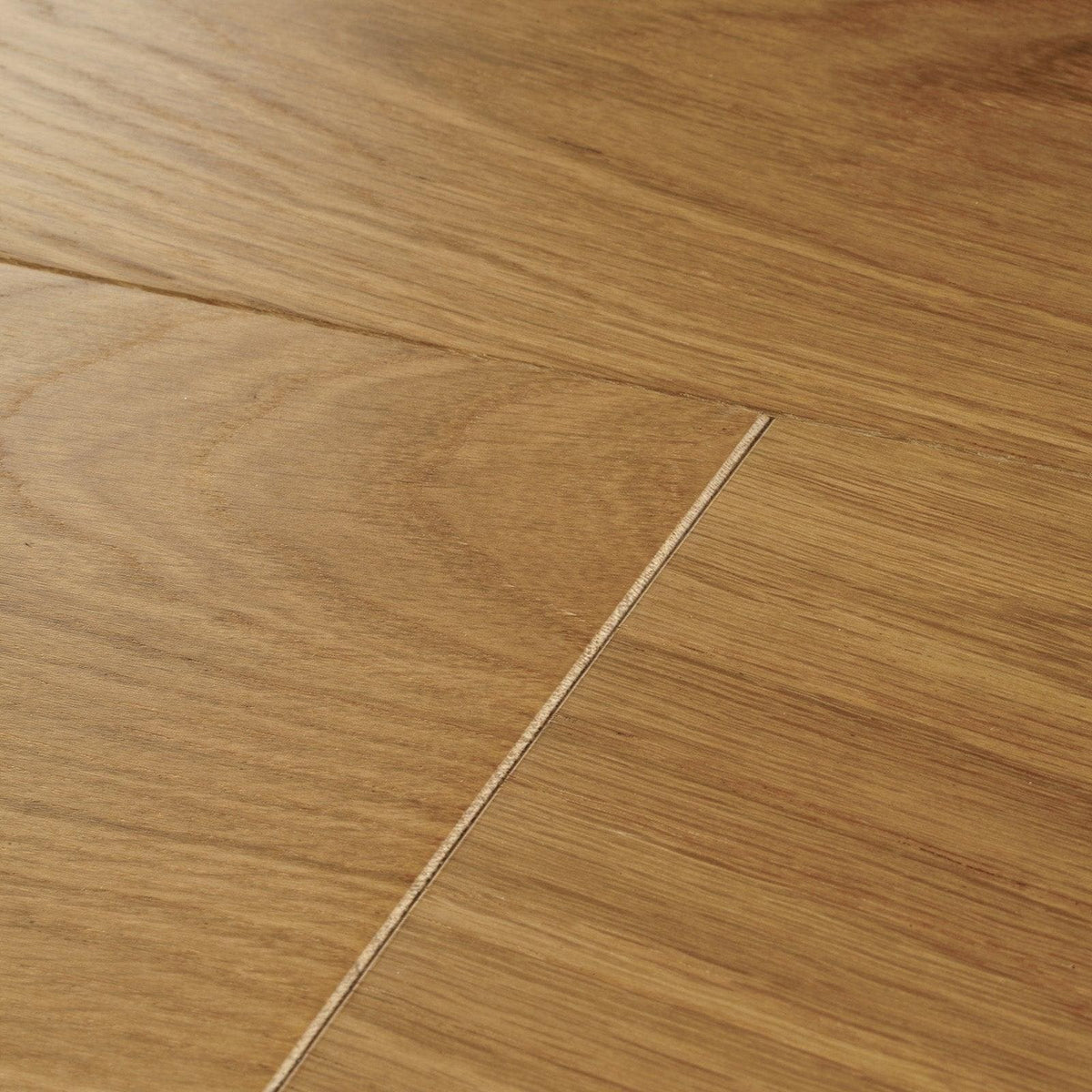 Light brown harlech rustic oak hardwood floor planks with natural wood grain pattern for indoor flooring