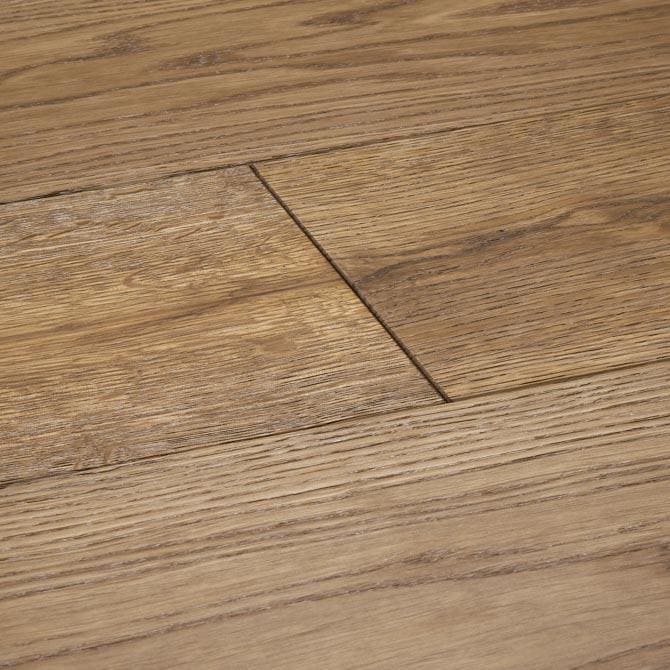 Light brown hardwood floor planks with natural wood grain pattern in harlech smoked oak finish