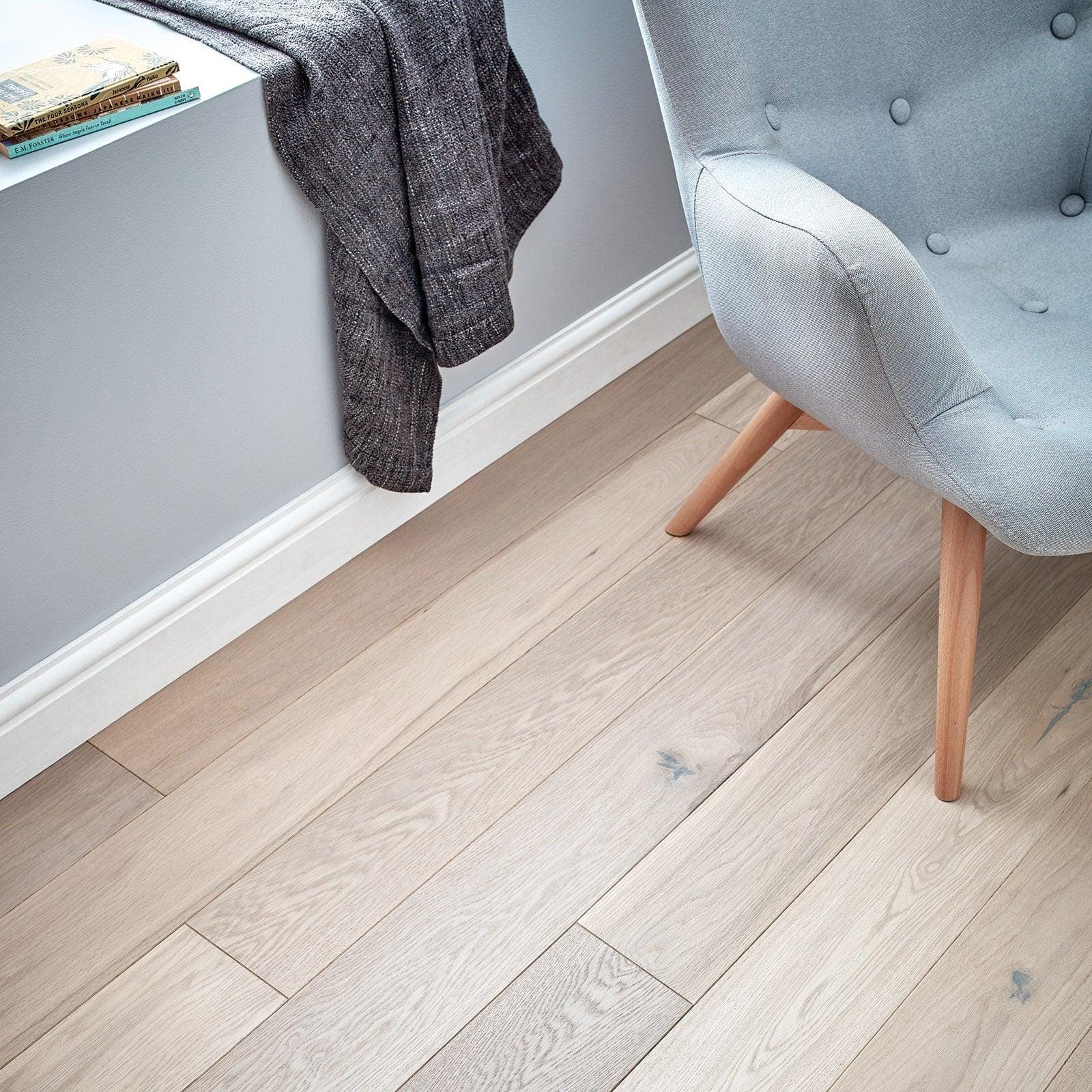 Light gray Harlech White oiled oak plank flooring with a natural wood grain finish for interior use
