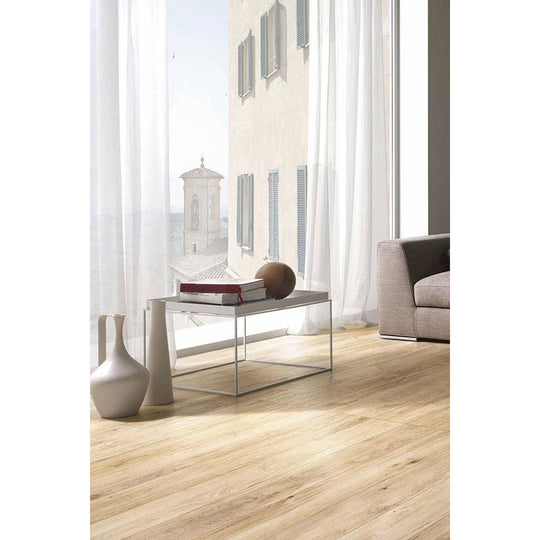 Kingfisher Oak light oak wood-effect floor tiles with a black metal coffee table