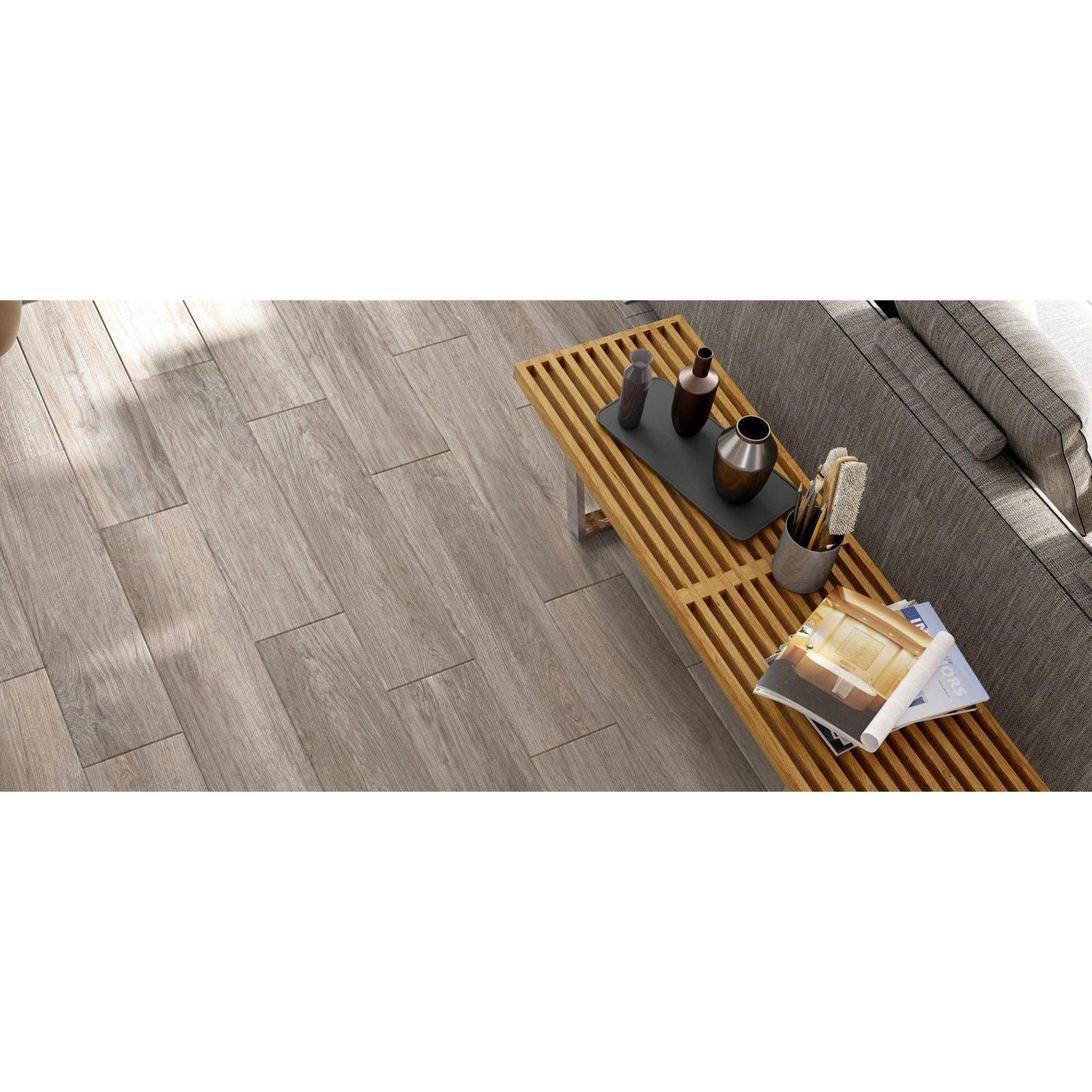 Gray wood-grain vinyl plank flooring in a modern minimalist design from landes gris collection