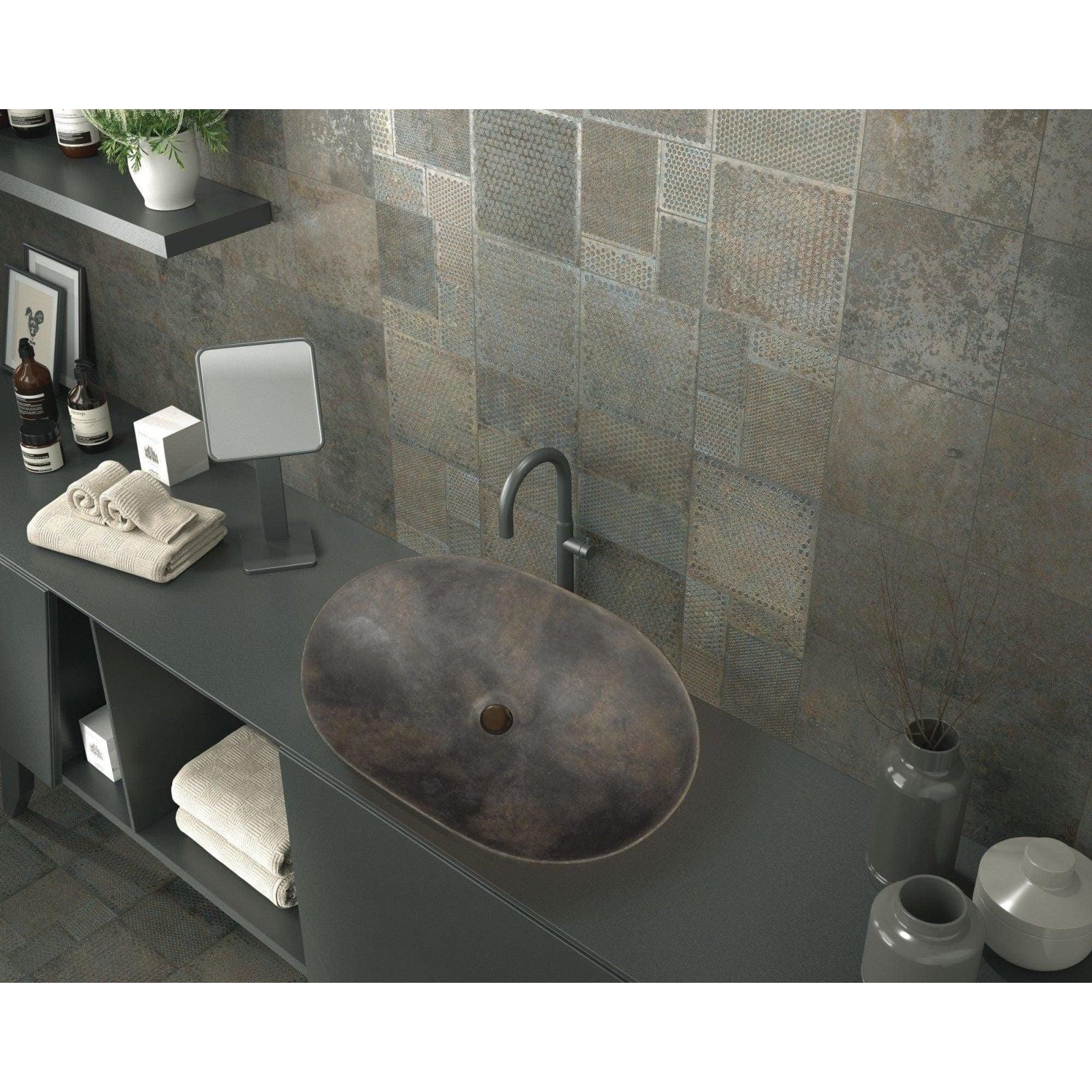 Antique bronze oval lavabo diurne oxide vessel sink with matte textured finish and central brass drain