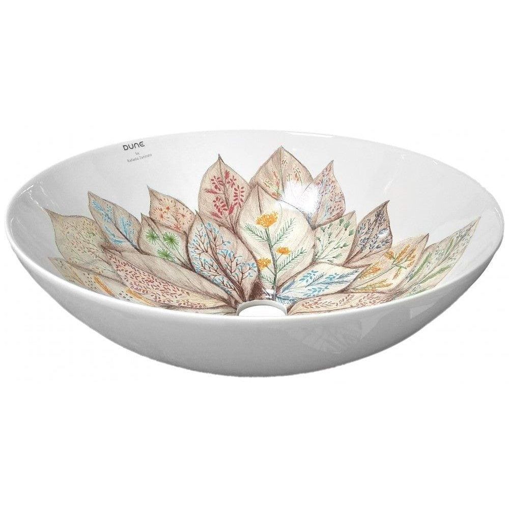 A white ceramic lavabo rafaela vessel sink with hand-painted layered leaves and floral design in earthy tones