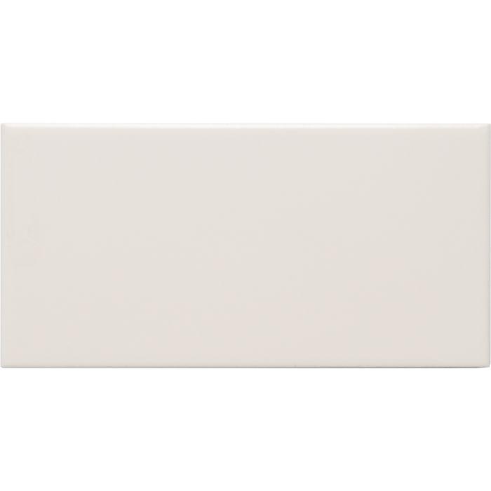 A sleek rectangular white ceramic lily satin half tile with a smooth glossy finish
