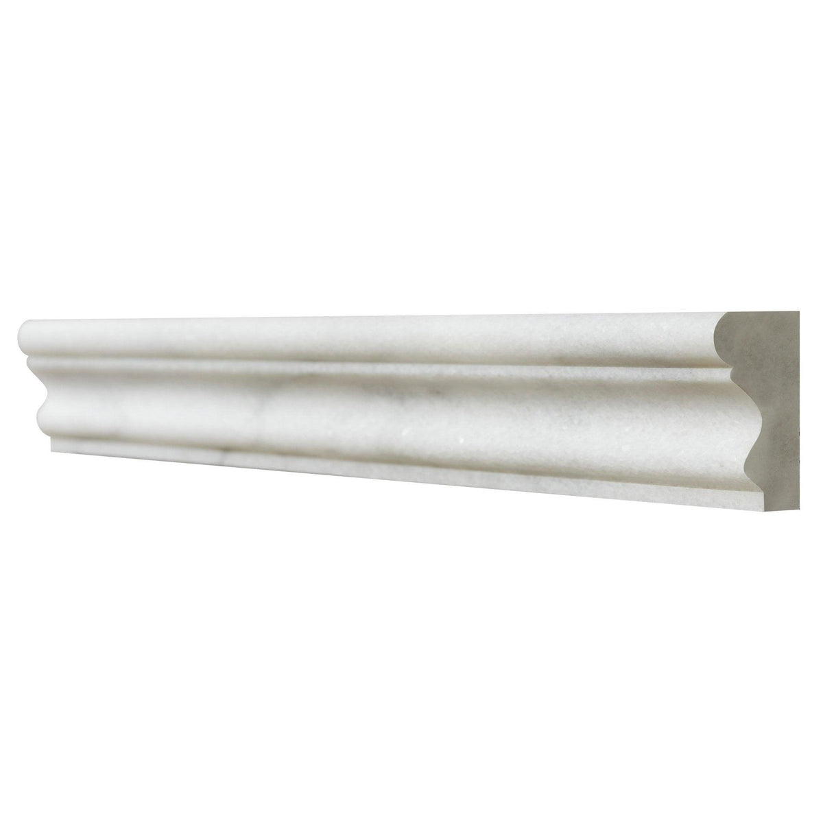 White marble-style crown molding with ornate classic profile in long island marble dado honed finish