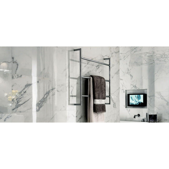 Marvel Calacatta Extra Lappato 30 x 60cm white marble-effect tiles with a chrome towel rack