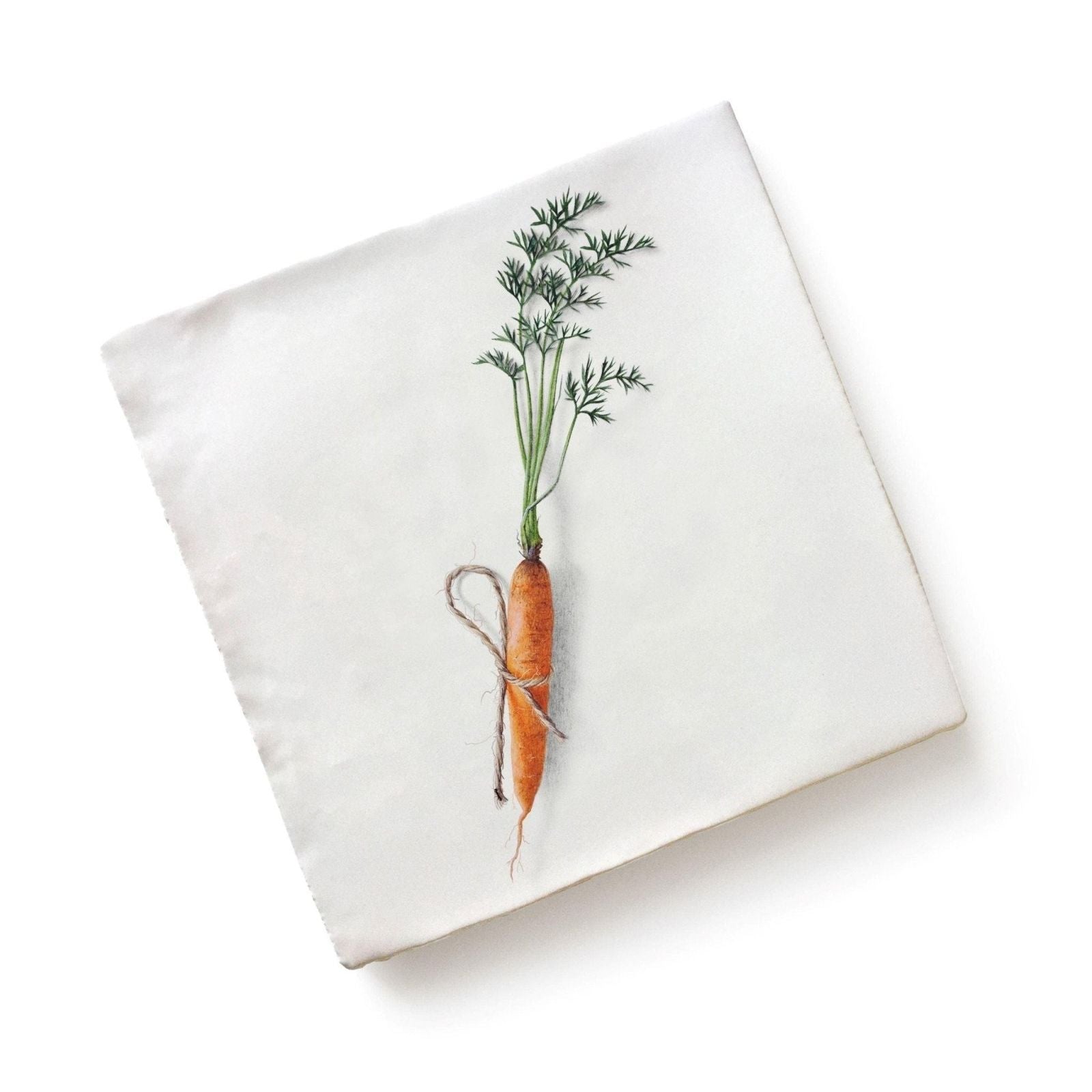 White square ceramic napkin by menagerie featuring an orange carrot illustration with green leaves tied with twine