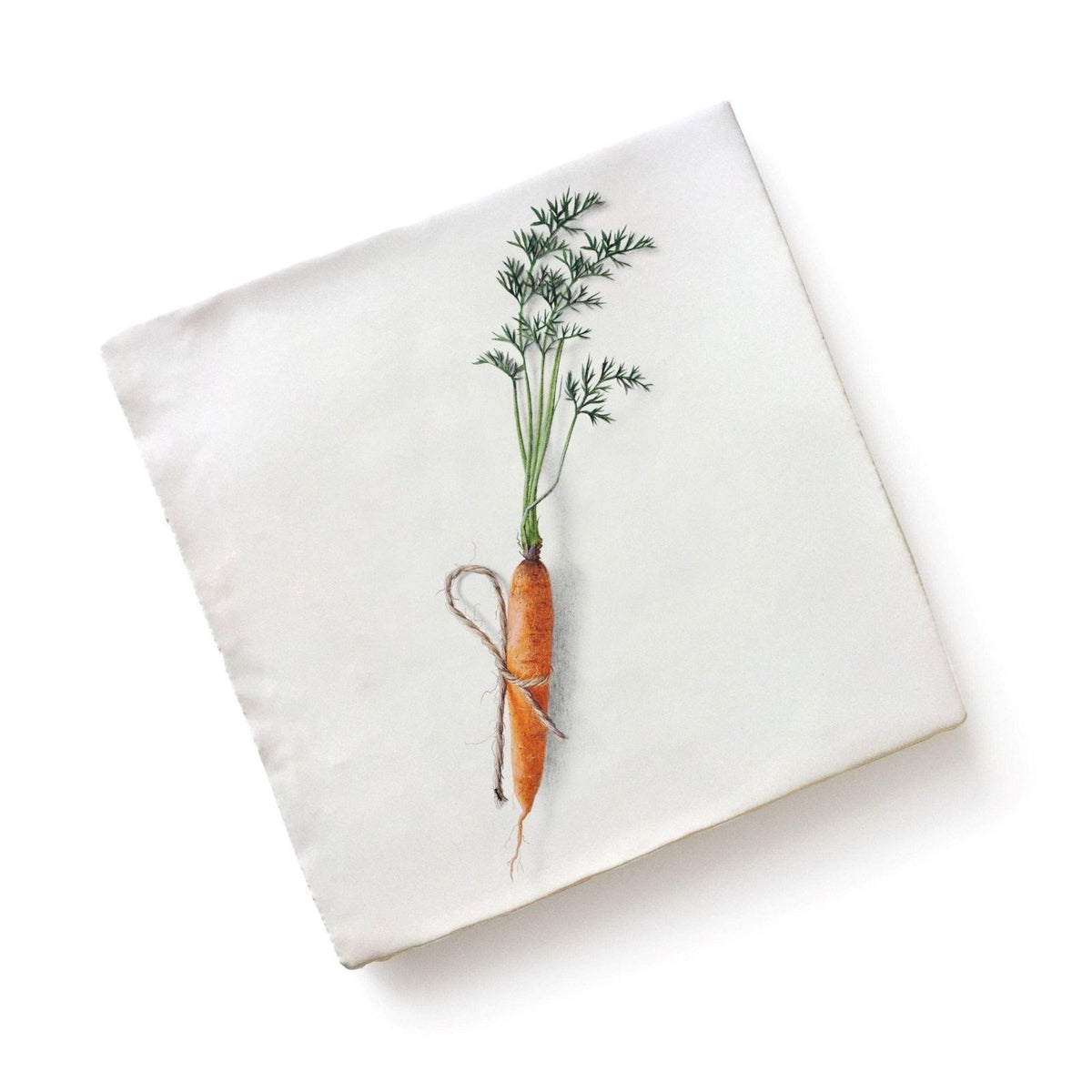 White square ceramic napkin by menagerie featuring an orange carrot illustration with green leaves tied with twine