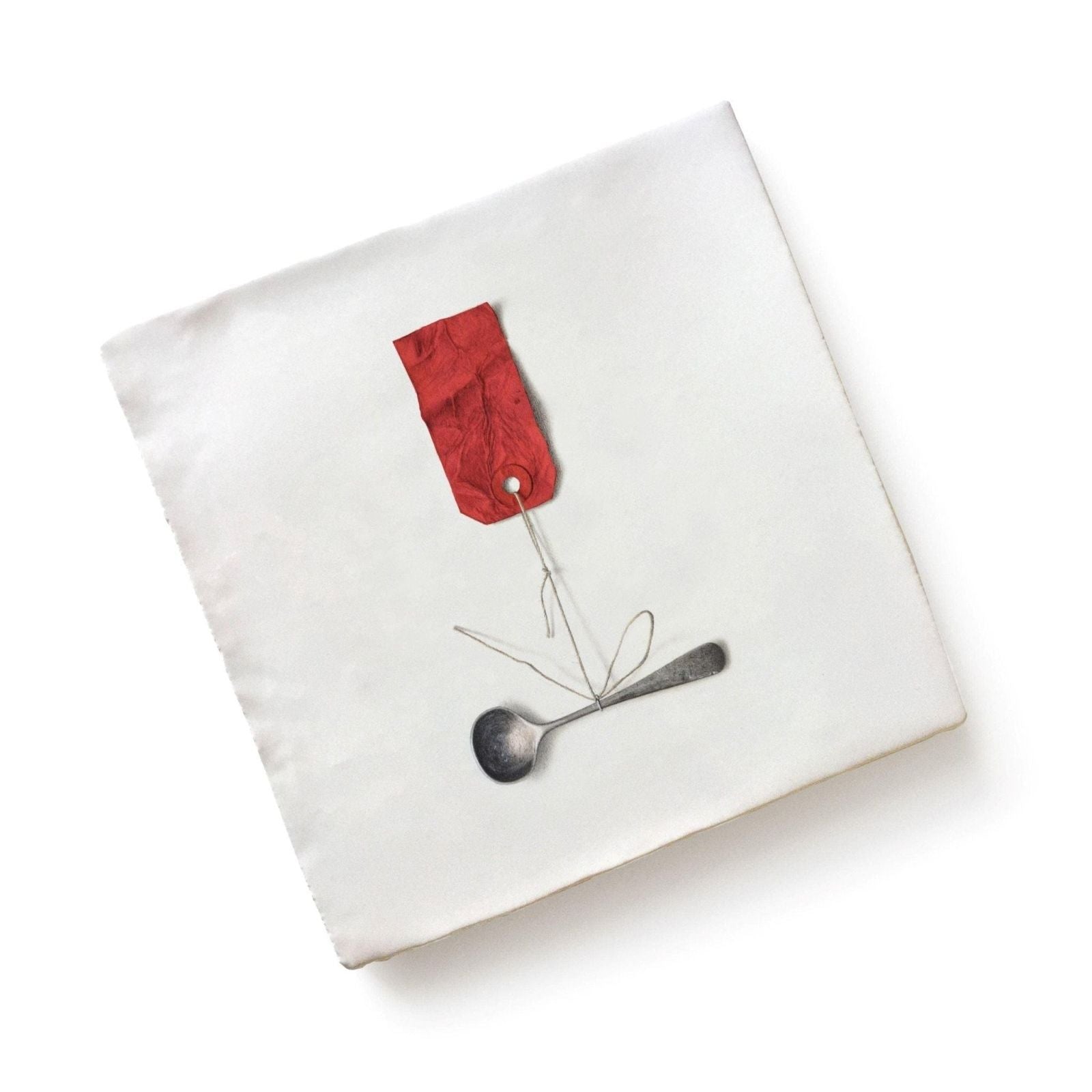 White canvas with a red tag and silver spoon illustration from menagerie ceramic by michael angove