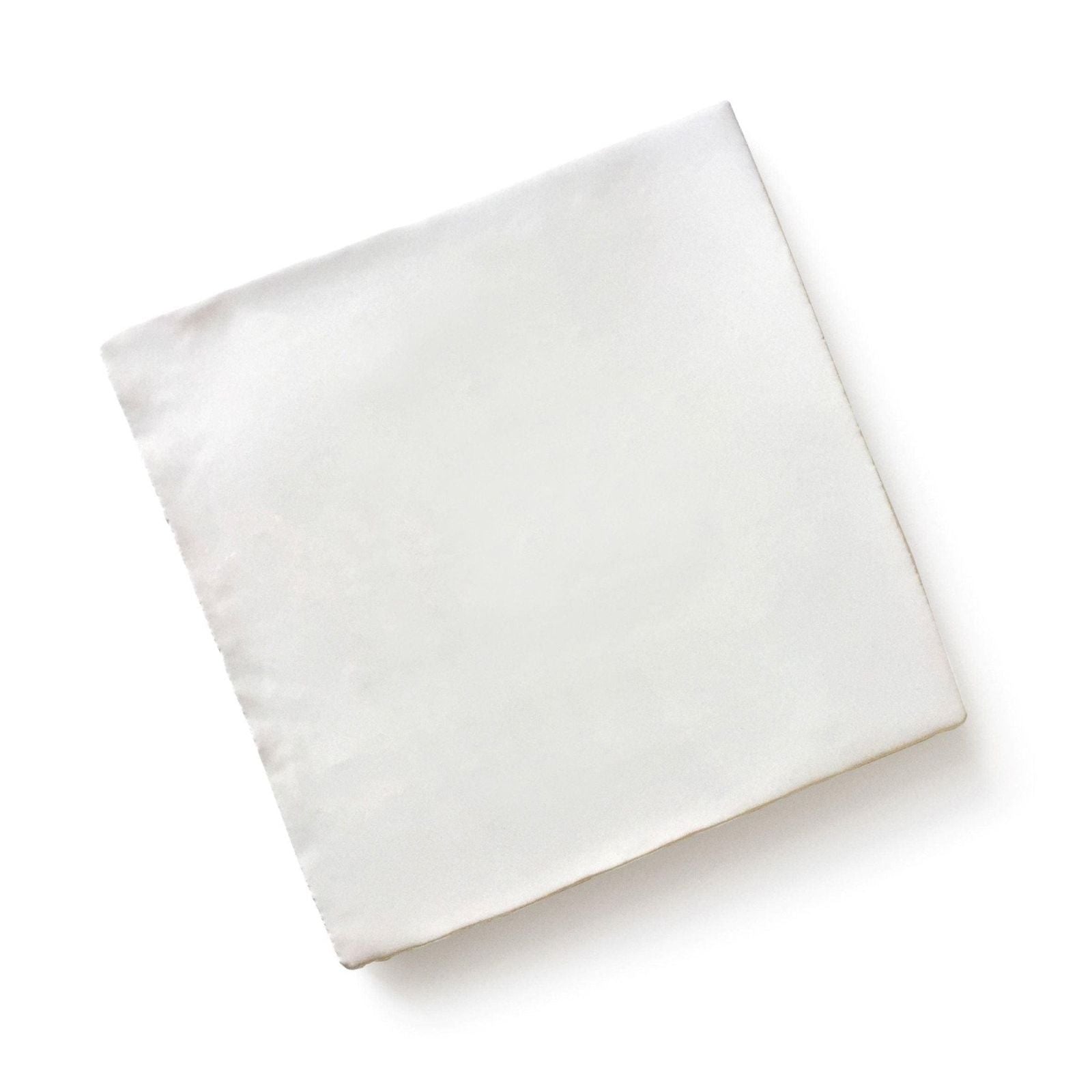 A crisp white cotton pillowcase neatly folded against a clean background in menagerie ceramic by michael angove style