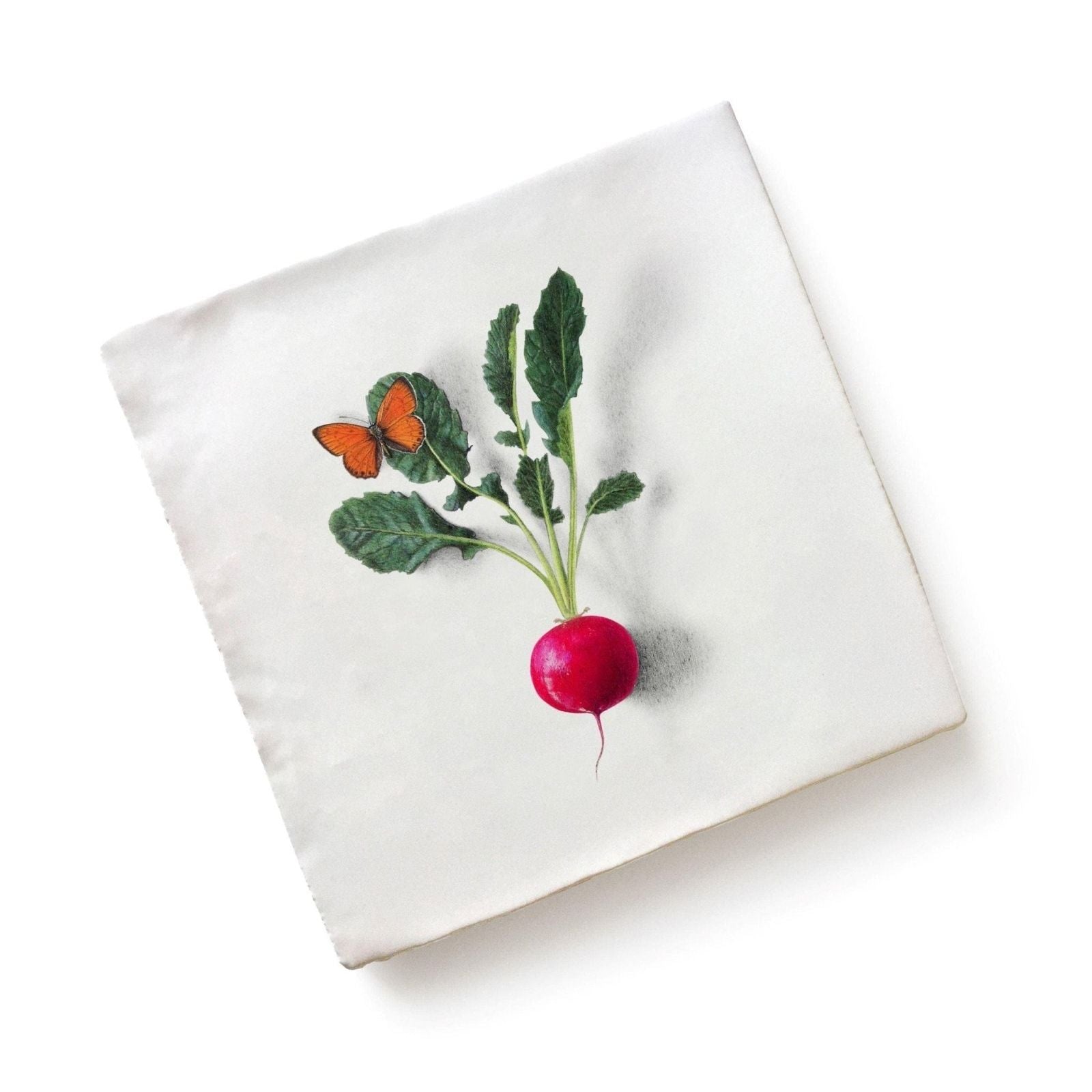 White square ceramic napkin by michael angove featuring a detailed red radish with green leaves and orange butterfly design