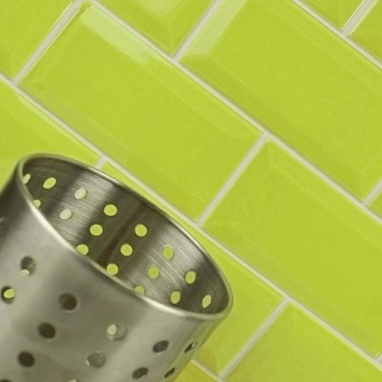 Silver metro menta gloss perforated metal strainer with brushed finish and evenly spaced circular holes